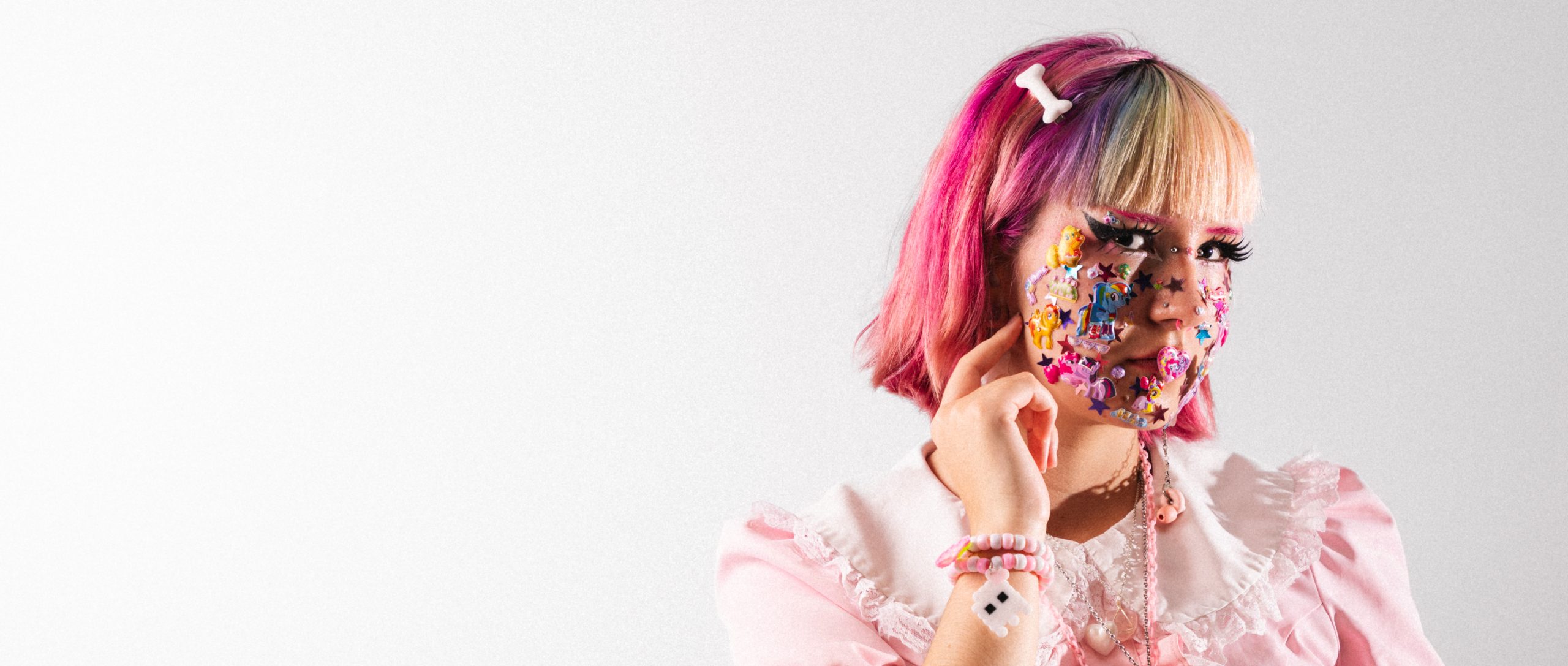 Vibrant portrait of a woman with a pastel colour scheme for a Notting Hill product hero
