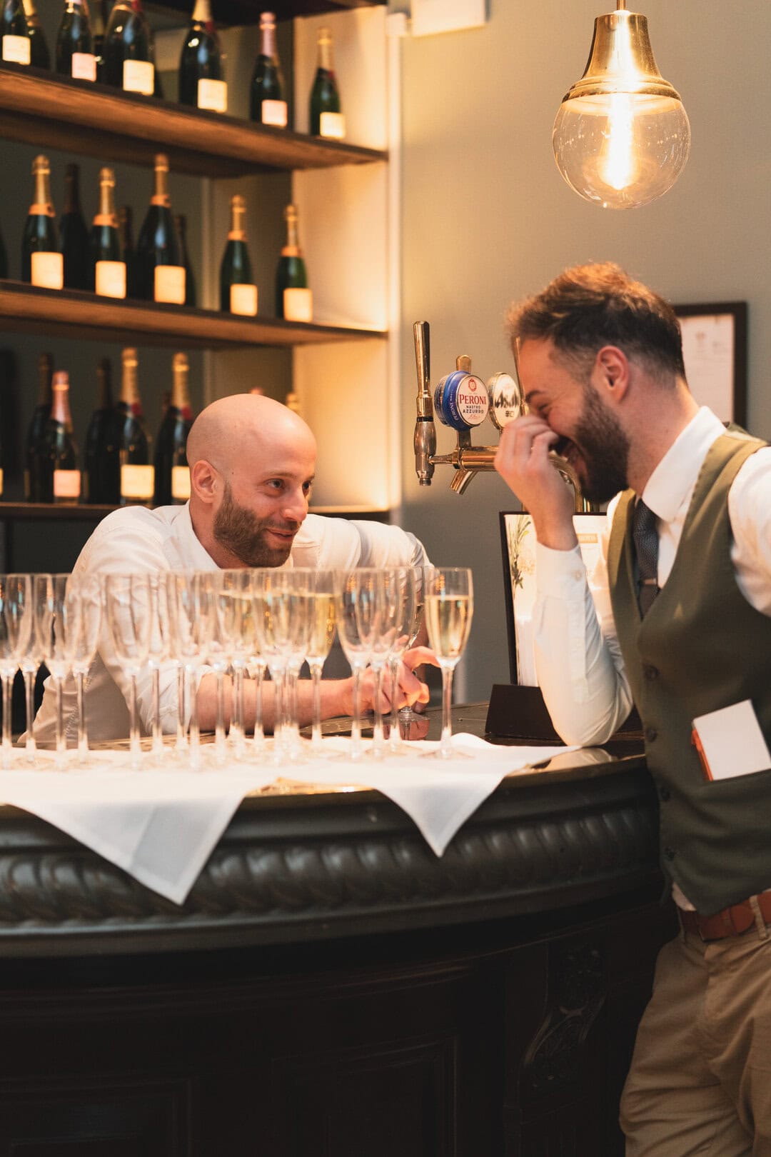 Bar staff talking, social media content photography London