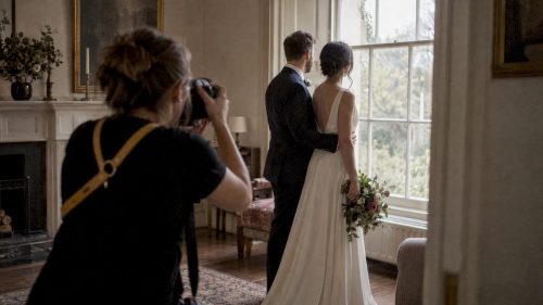 Photographer making a relaxed wedding portrait
